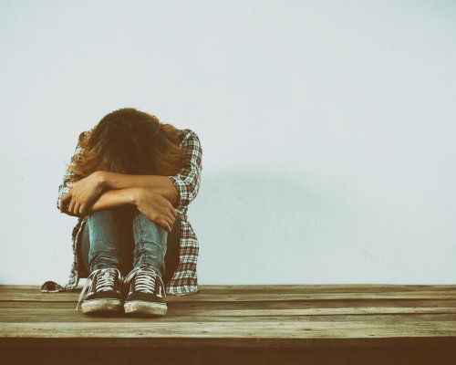 Sad woman hug her knee,nobody